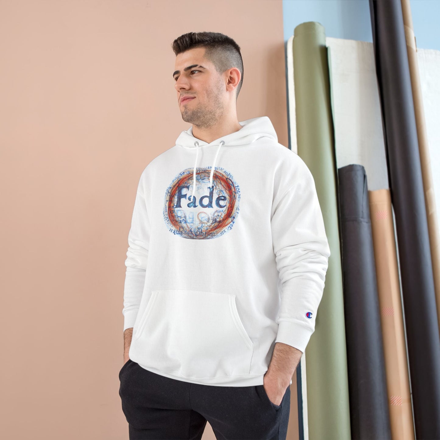 White unisex hoodie with "Fade" graphic design, worn by a model. A stylish, contemporary piece perfect for streetwear and casual outfits.