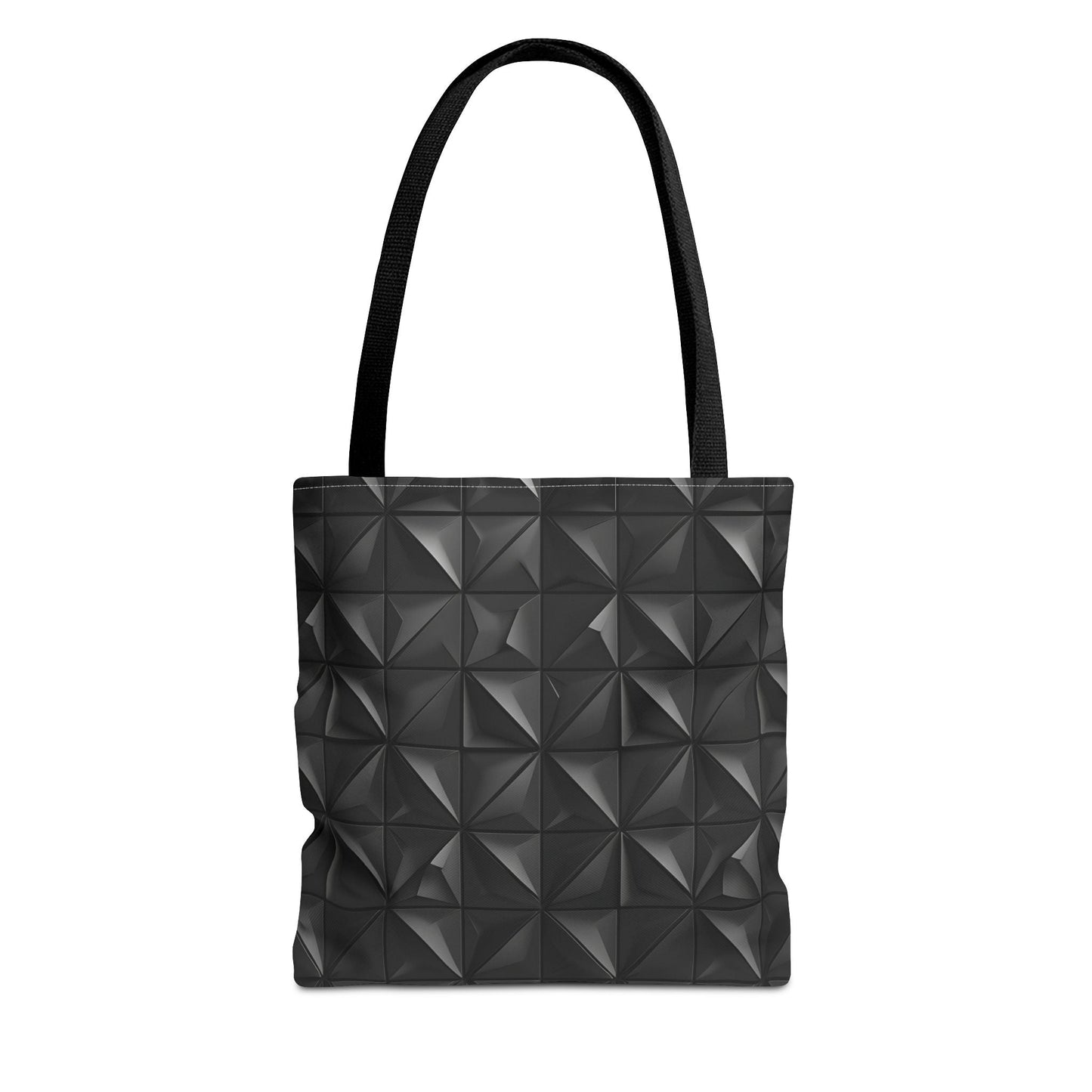The tote bag has a matte black base embossed with a 3D pyramid tile pattern, with the vertices of each triangle repeating.