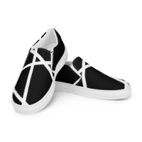 Shoes with black base and white line.