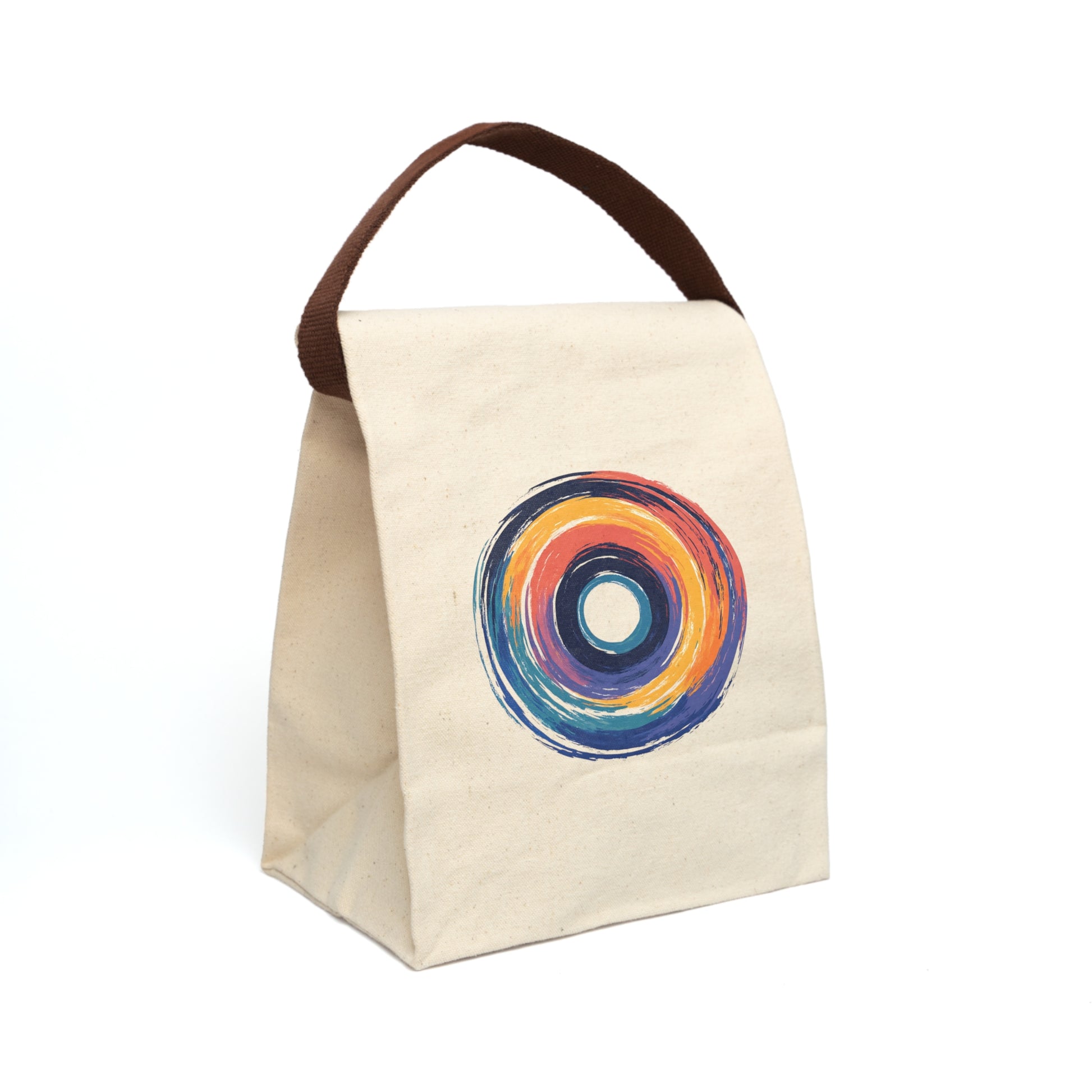 Slightly oblique right view of a beige lunch bag with an abstract circular design in bright orange, red, yellow and blue brush strokes.