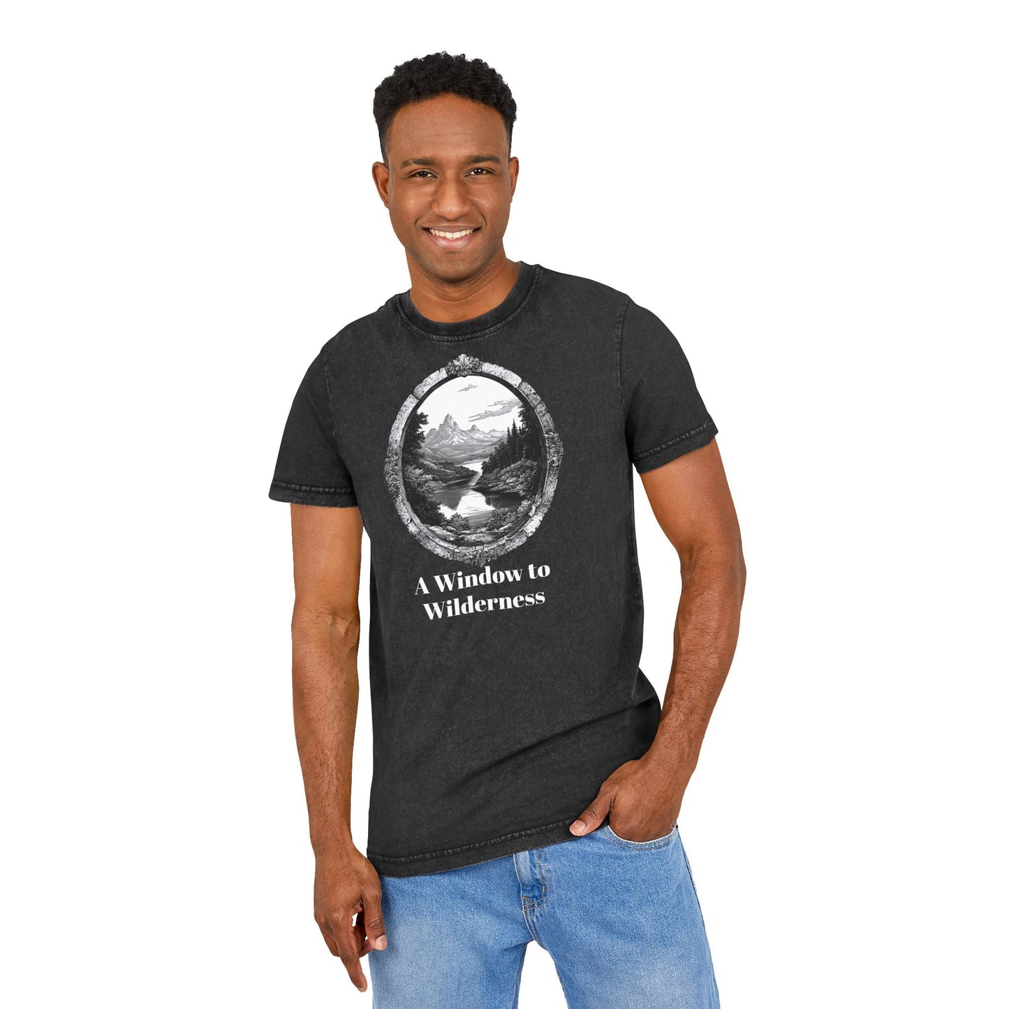 A man is wearing a T-shirt featuring a deep black color with a unique acid wash finish.
