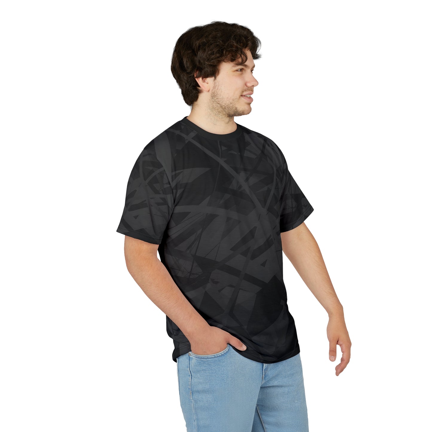 This sophisticated all-over black geometric patterned T-shirt is being worn by a man facing to the right.