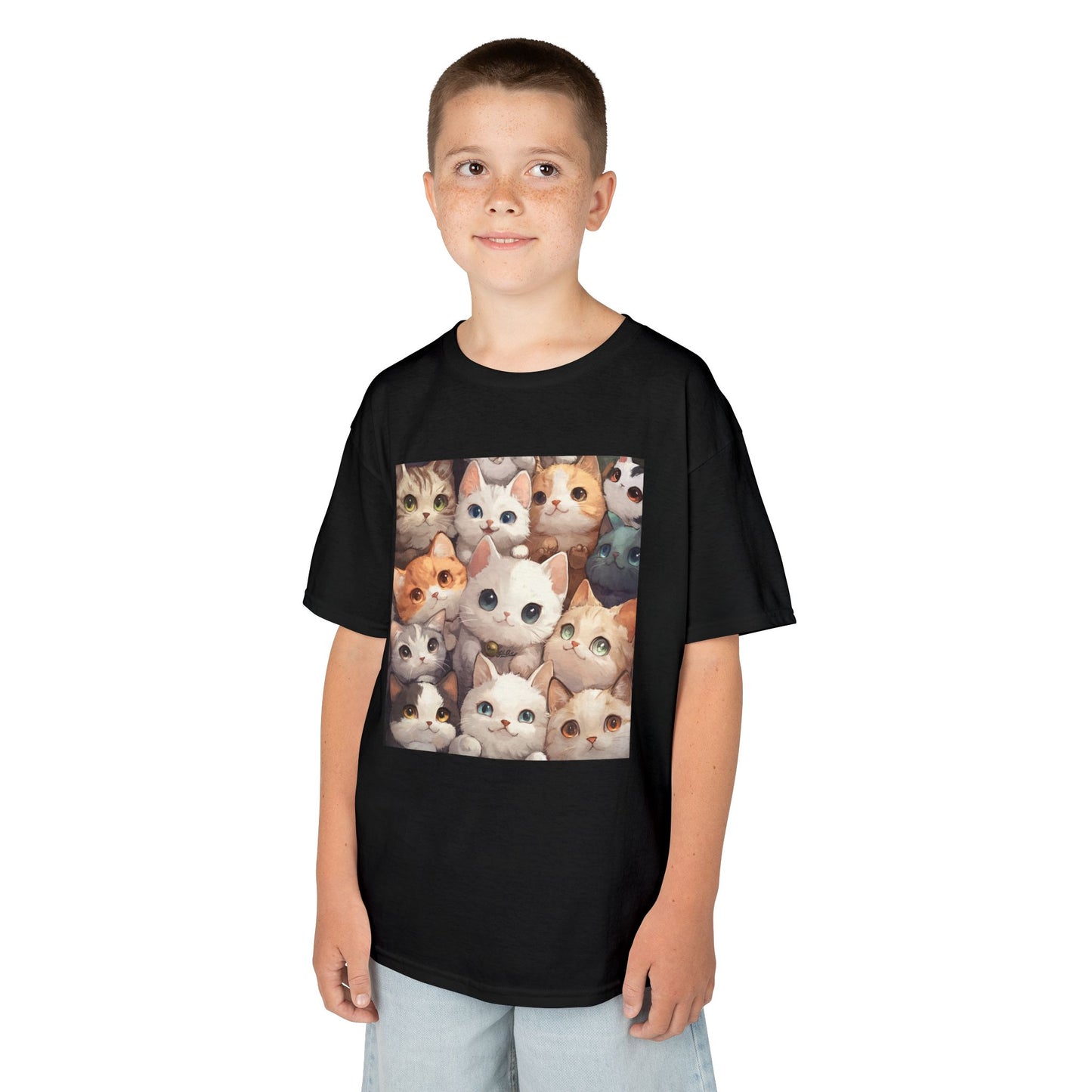 A young boy wearing a Black T-shirt featuring a charming design with an abundance of adorable cats.
