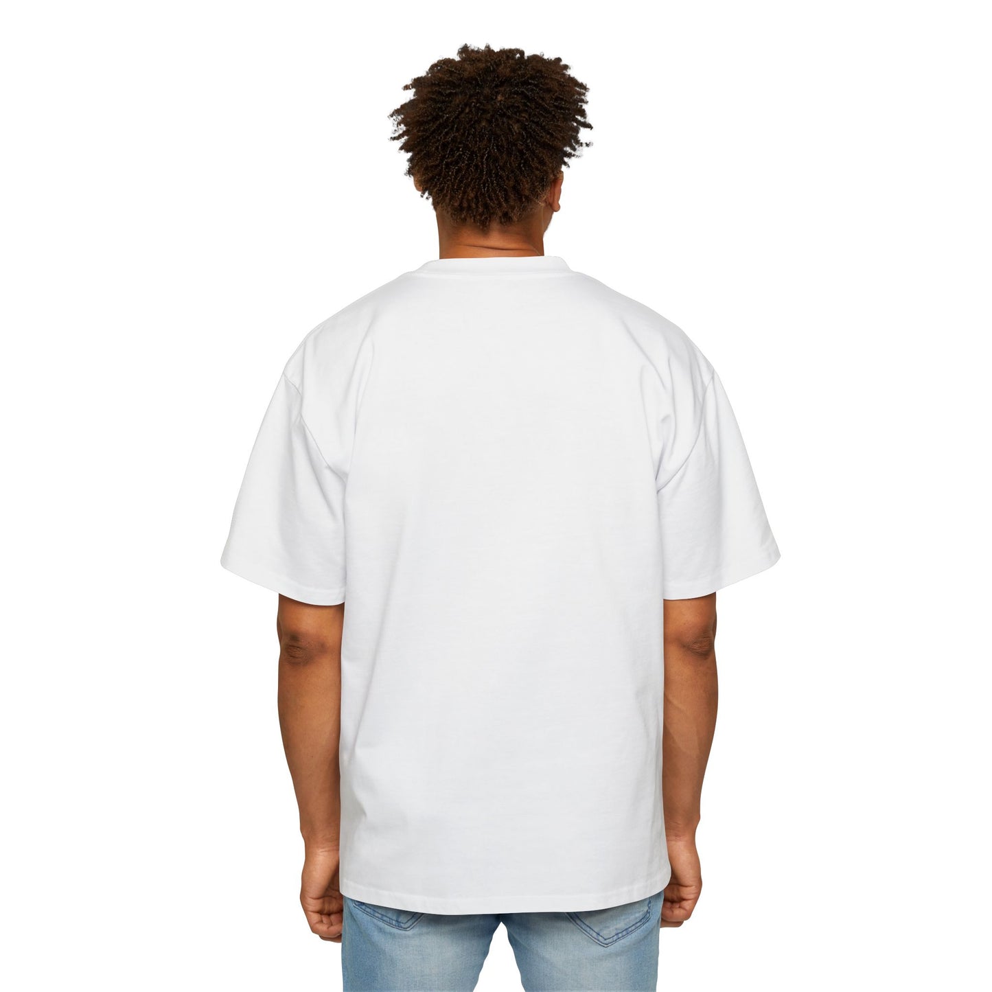 The back view of a man standing and wearing an oversized White T-shirt.
