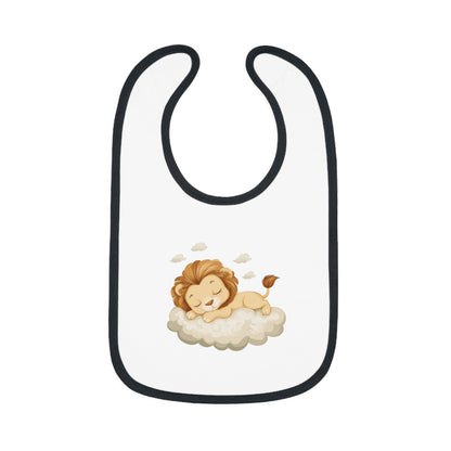 This adorable bib has a black-colored trim with a white base, featuring a design of a cute lion peacefully sleeping on a fluffy cloud.