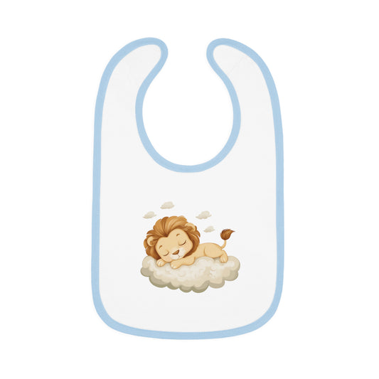 This adorable bib has a light blue-colored trim with a white base, featuring a design of a cute lion peacefully sleeping on a fluffy cloud.