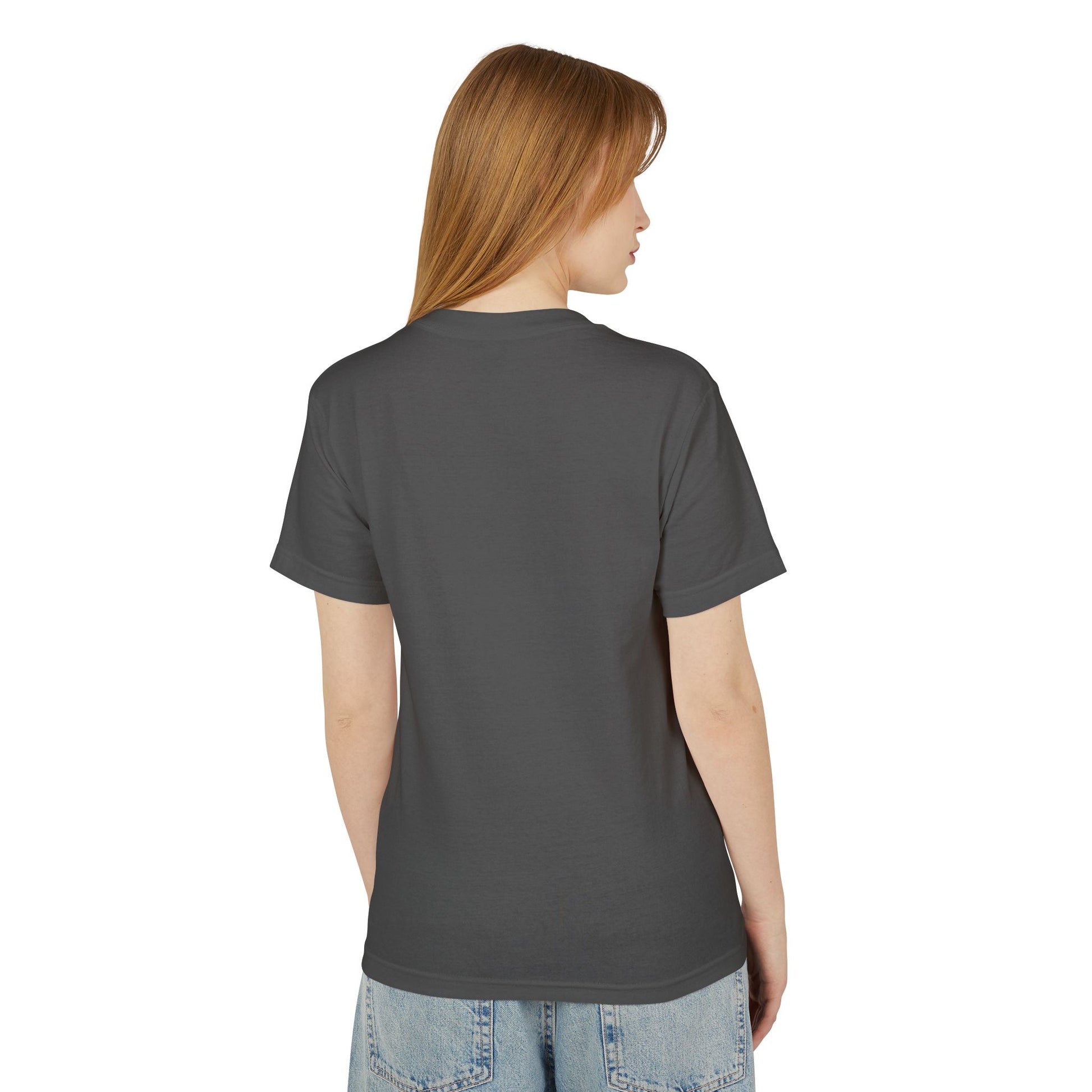 The back view of a woman standing in a Faded Black unisex vintage T-shirt.
