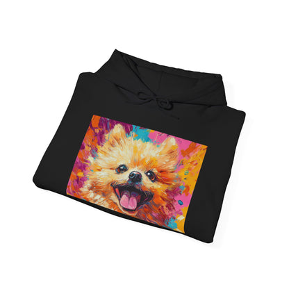 A Black hoodie featuring a vivid acrylic-style artwork of a Pomeranian dog.
