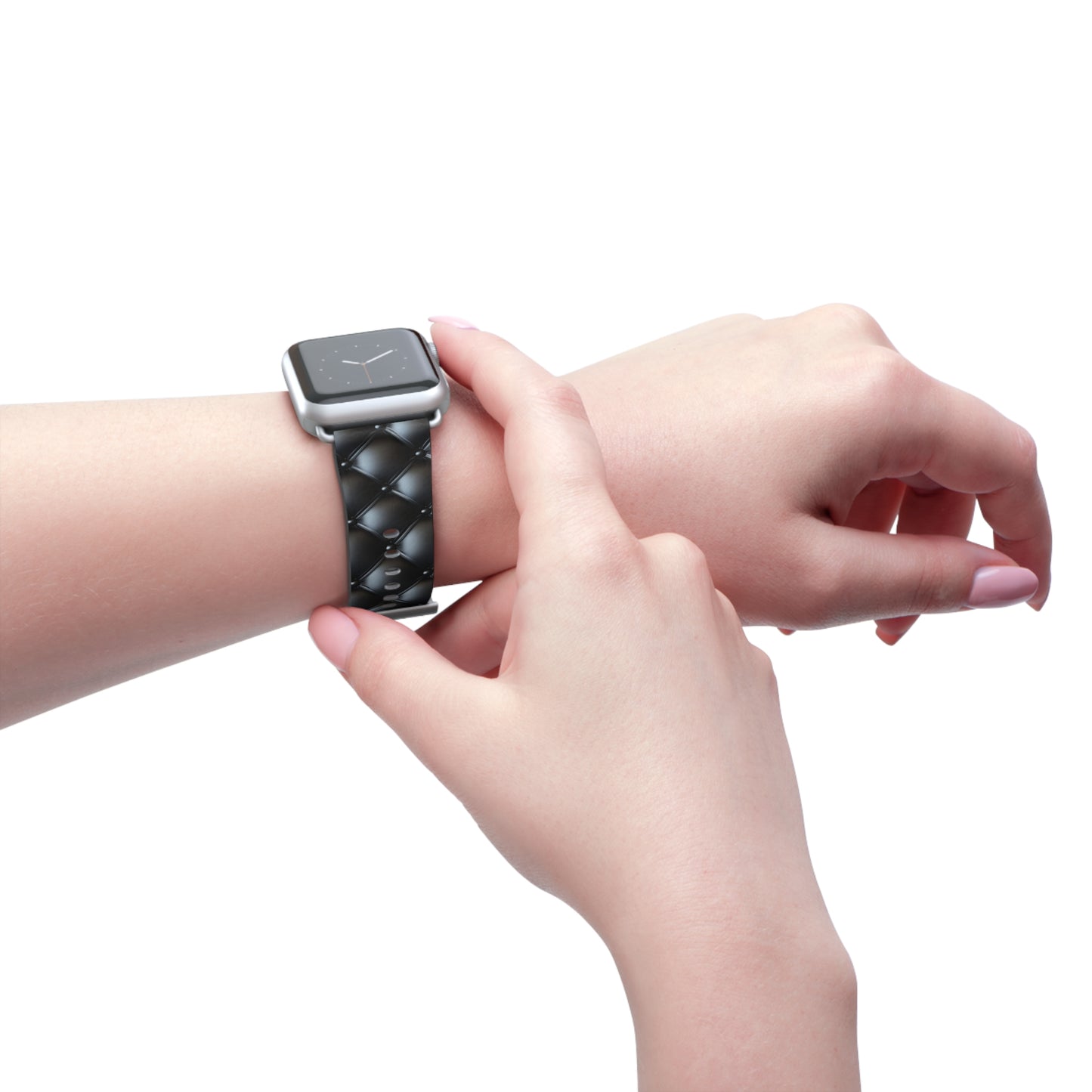 Wearing an Apple Watch band in silver matte on the left wrist, featuring a beautiful quilted leather-like texture, a square pattern, and delicate button-like details.