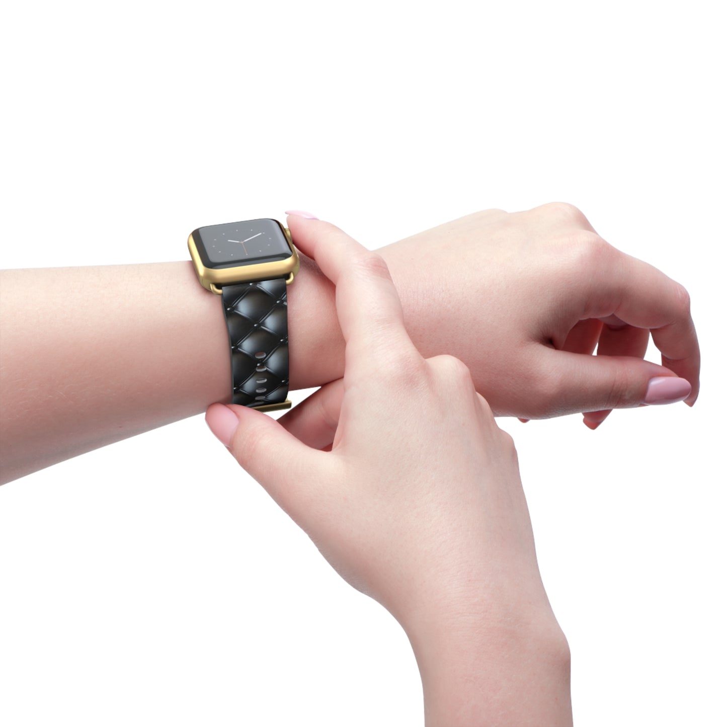 Wearing an Apple Watch band in gold matte on the left wrist, featuring a beautiful quilted leather-like texture, a square pattern, and delicate button-like details.