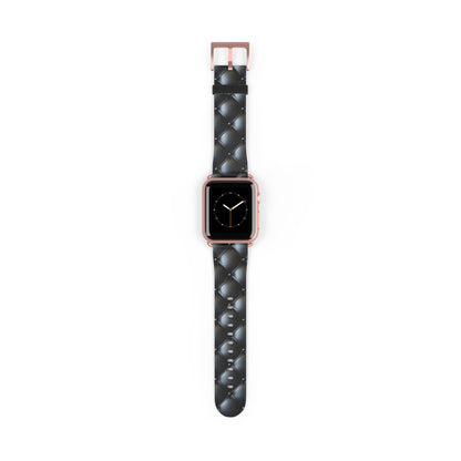 An Apple Watch band in rose gold matte featuring a beautiful quilted leather-like texture, a square pattern, and delicate button-like details.