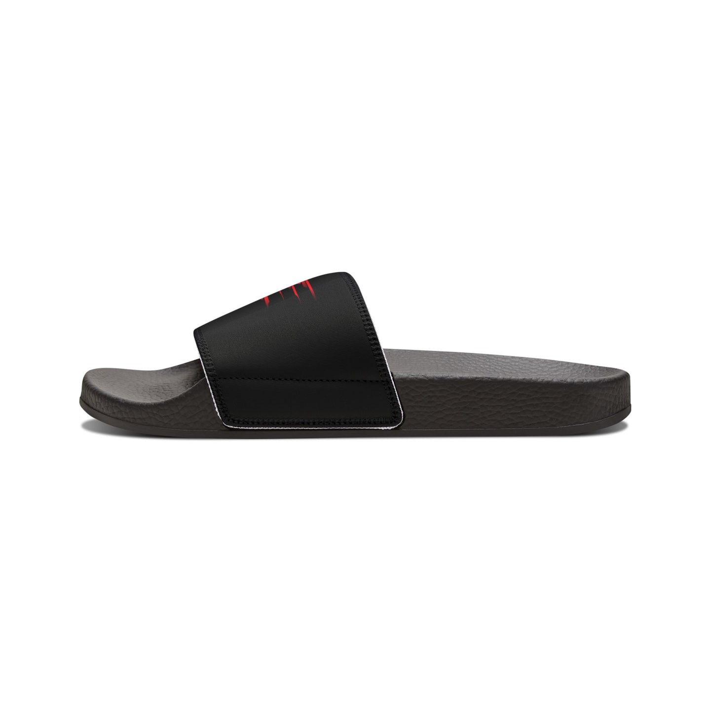 The inner angle of sandals featuring a bold red and black graphic design.