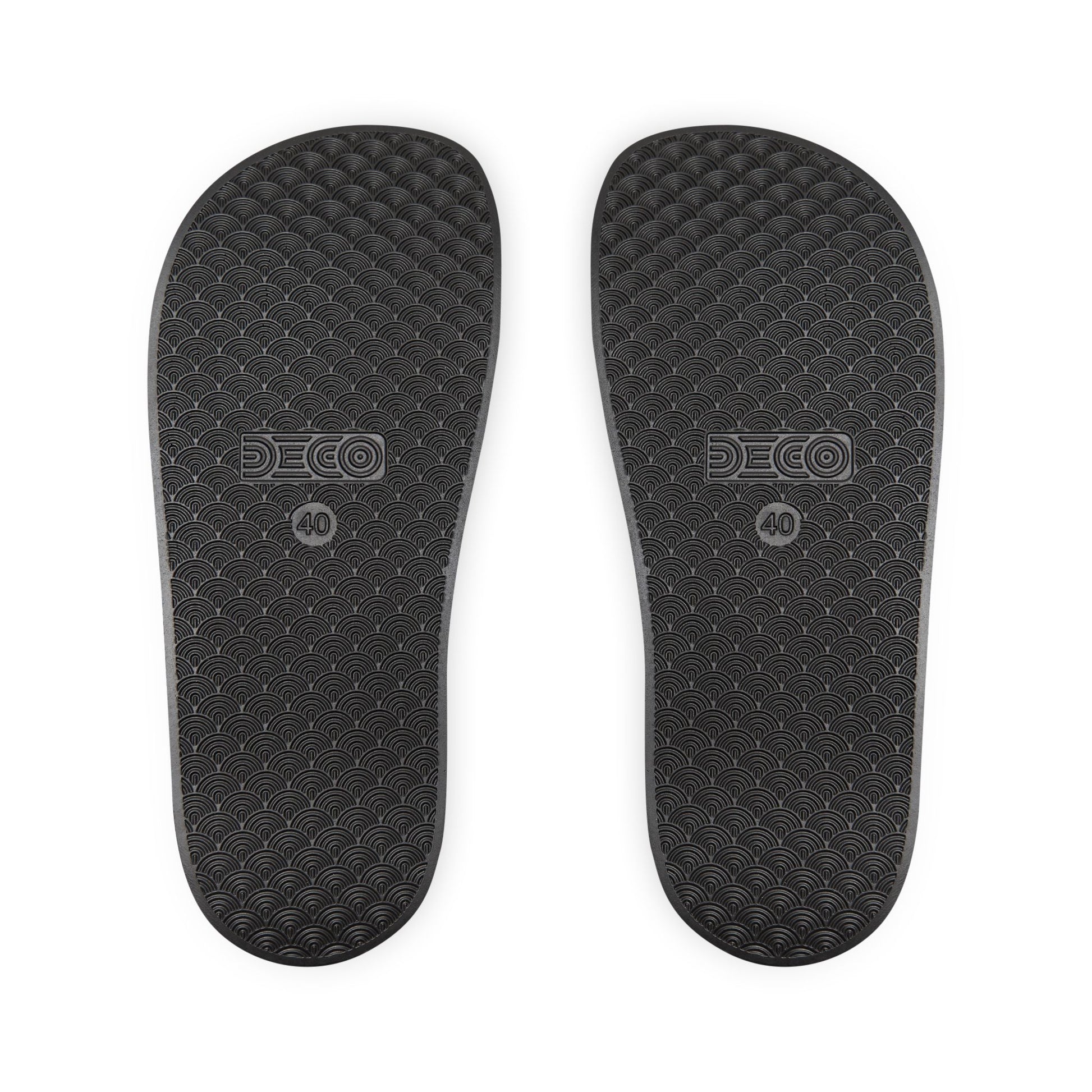 The black sole of the sandals.