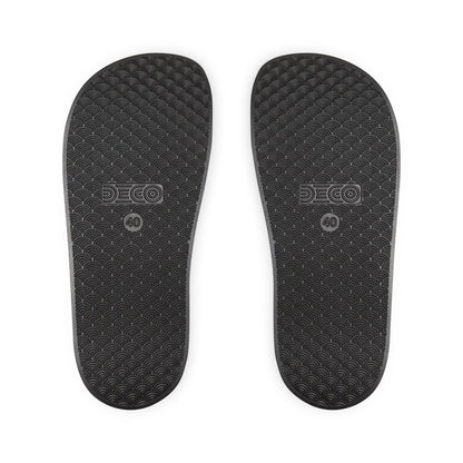 The black sole of the sandals.