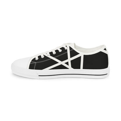 The inner part of the sneakers boldly features an abstract geometric pattern in black and white.