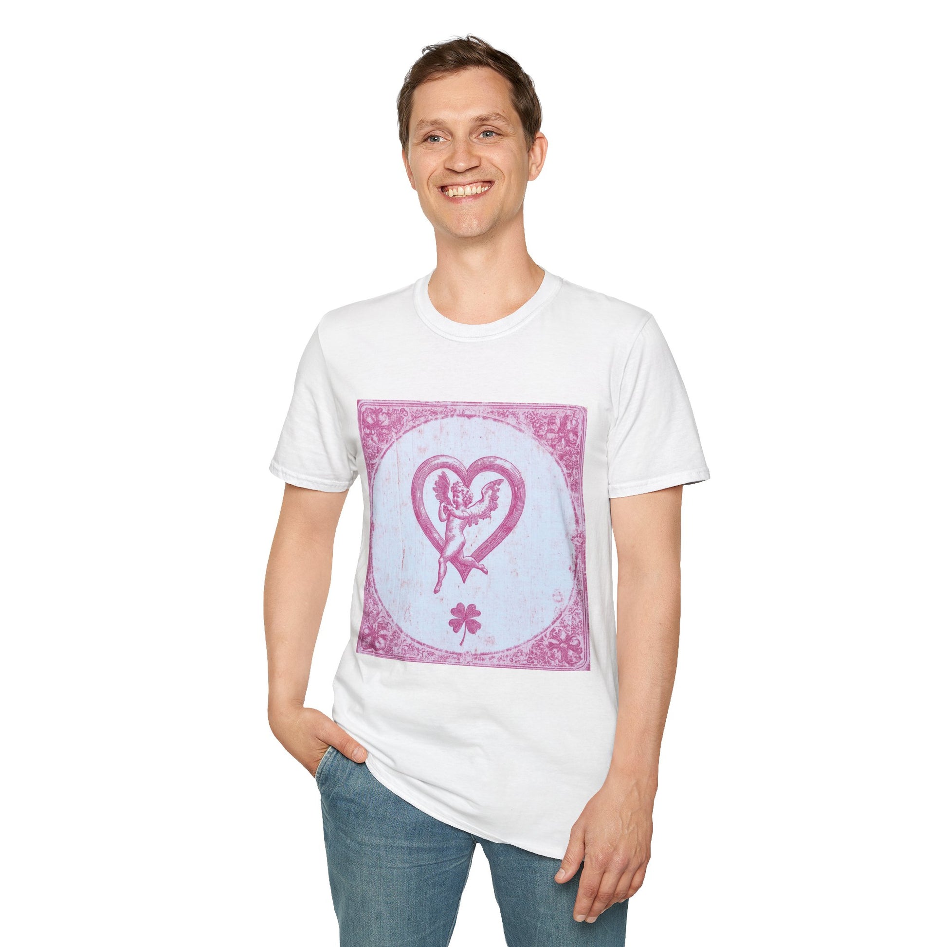 A man standing with one hand in his jeans pocket, wearing a White T-shirt featuring a vintage 1980s tarot card design with pink risograph and bold gothic typography.