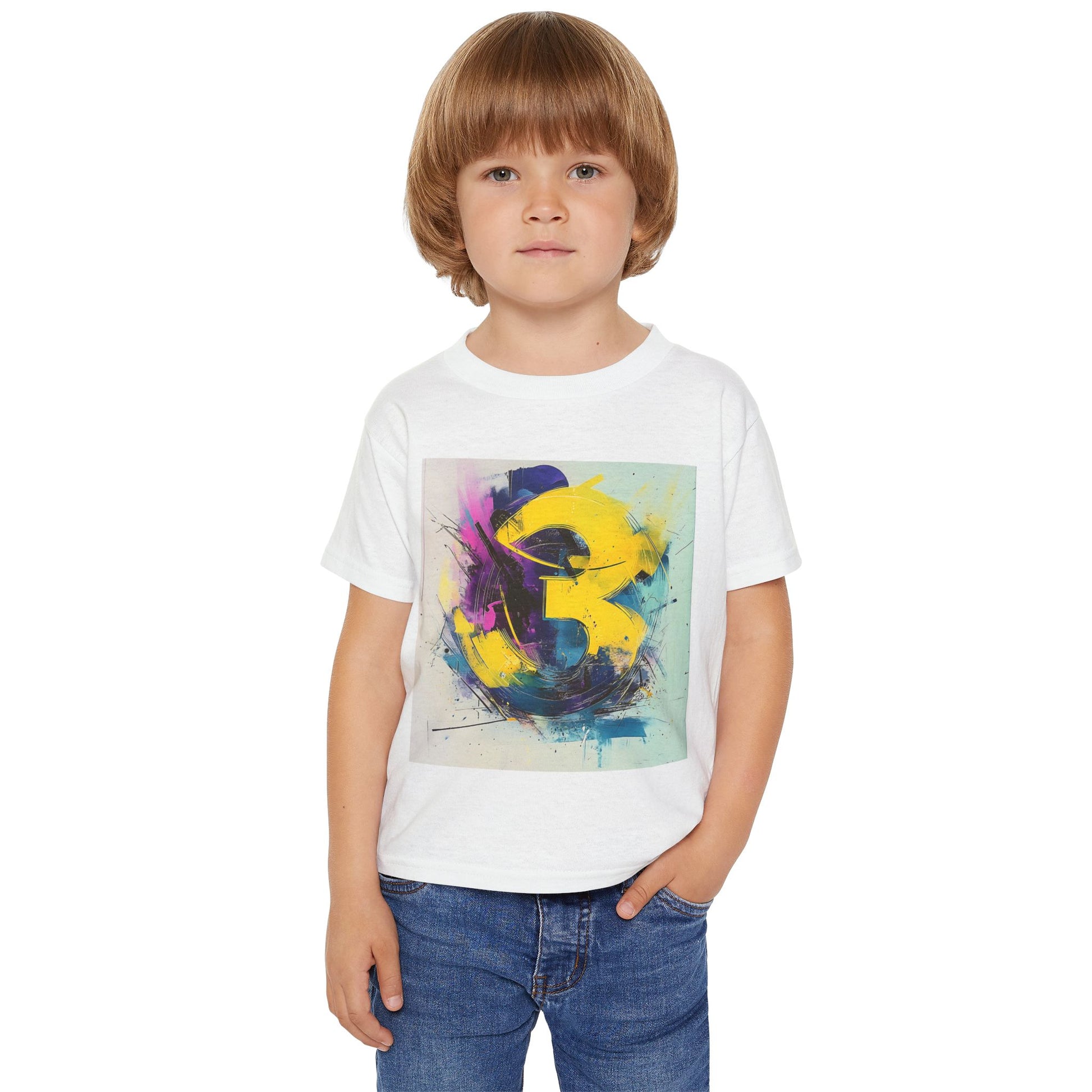 A boy in a white T-shirt with bold yellow, purple, and blue abstract brushstrokes, his left hand in his pocket.