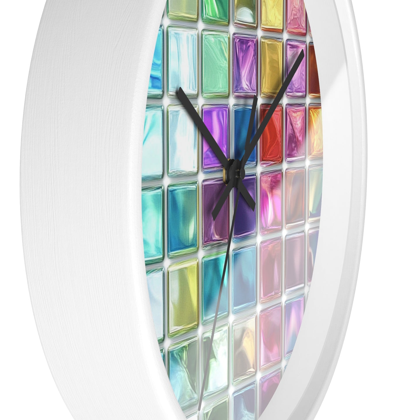 This wall clock features a grid of colorful glass squares like stained glass, with white edges and black hands, with the left side visible in the foreground.