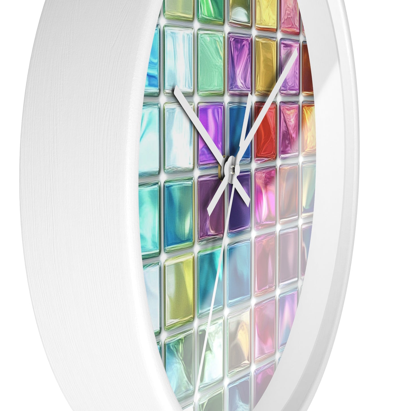 This wall clock features a grid of colorful glass squares like stained glass, with white edges and white hands, with the left side visible in the foreground.