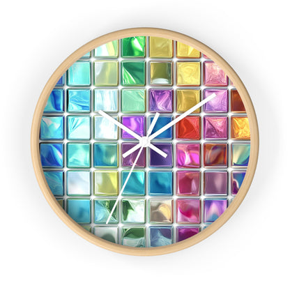 This wall clock features a grid of colorful glass-like squares with a vibrant design inspired by stained glass, showcasing a wooden base and white hands.