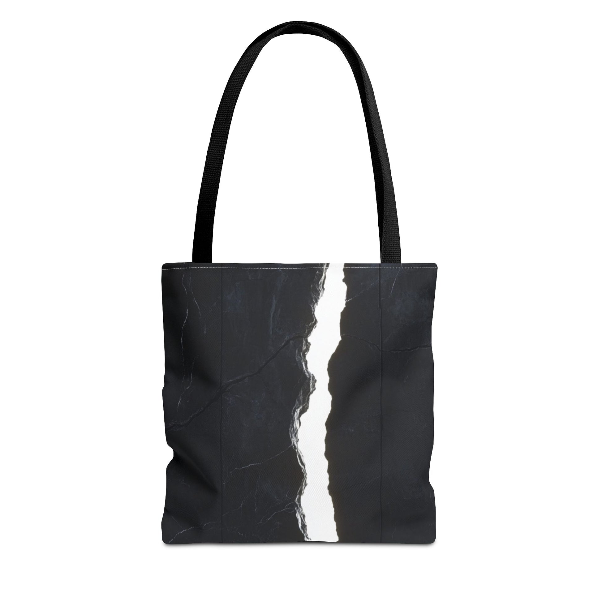 A Black-handled tote bag featuring a massive black wall with white cracks, light shining through, and a central black vertical rock.