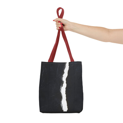 Holding a Red-handled tote bag with a massive black wall, white cracks, light streaming through, and a central black vertical rock.